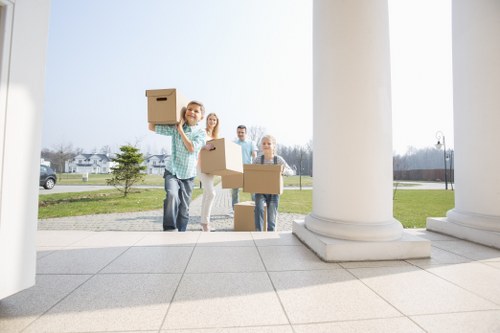 Chasecross moving team loading furniture into a van