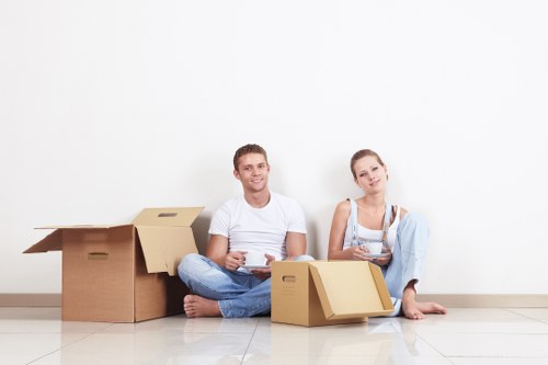 Professional movers loading furniture for a local move in Chasecross